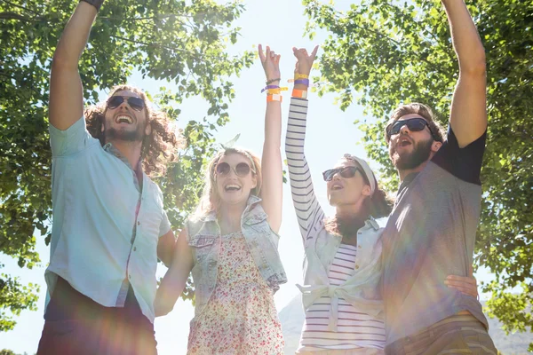 Happy friends jumping and cheering — Stock Photo, Image