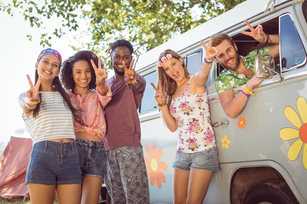 Hipsters smiling at camera in campsite — Stock Photo, Image
