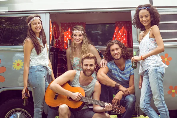 Hipster friends in camper van at festival — Stock Photo, Image