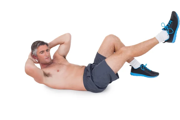 Fit man doing sit ups with no shirt on — Stock Photo, Image