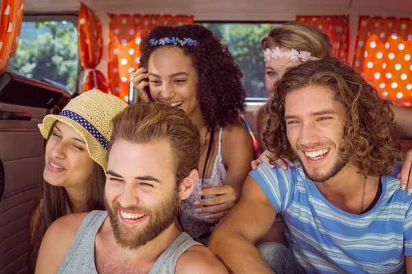 Hipster friends in a camper van — Stock Photo, Image