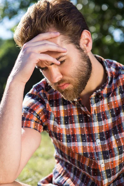 Handsome hipster feeling sad — Stock Photo, Image