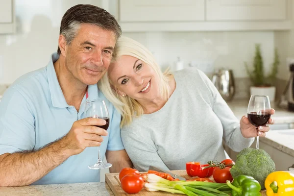 Mature couple having red wine — Stock Photo, Image