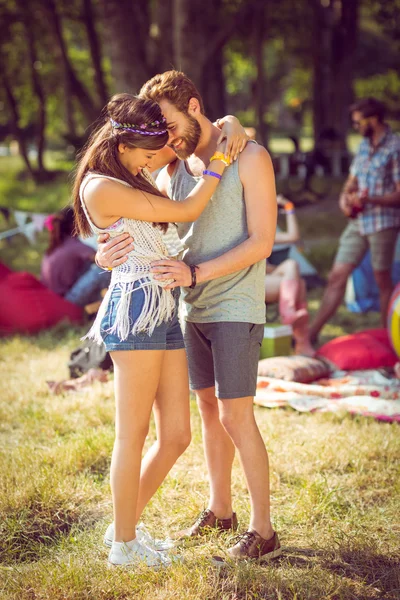 Hipster couple smiling and hugging — Stock Photo, Image