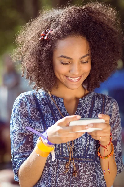 Pretty hipster looking at her selfie — Stock Photo, Image