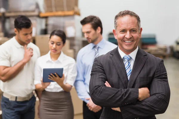 Boss standing with arms crossed — Stock Photo, Image