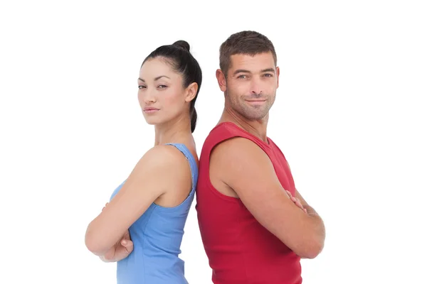 Ajuste hombre y mujer sonriendo —  Fotos de Stock