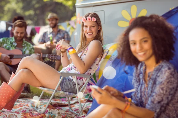 Carefree hipster relaxing on campsite — Stock Photo, Image