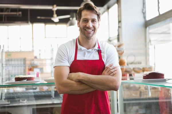 Happy server with arms crossed — Stock Photo, Image