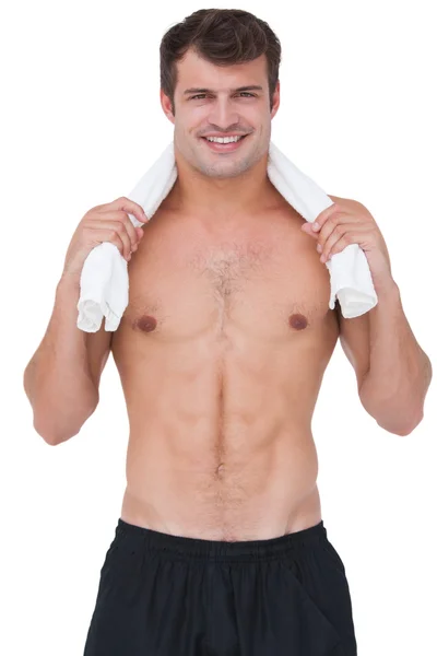 Ajuste hombre sin camisa sonriendo a la cámara — Foto de Stock