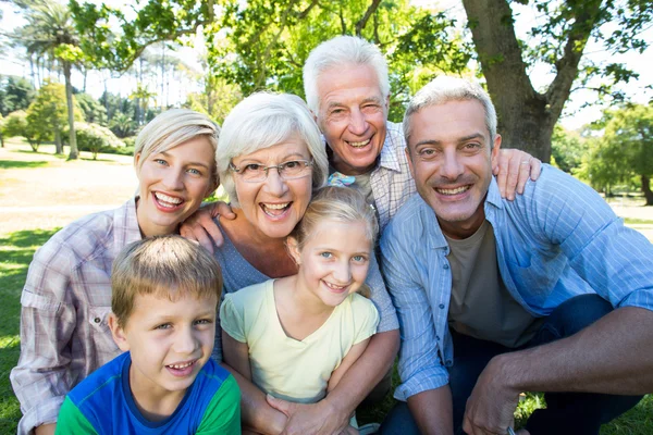Happy family smiling to the camera — Stock Photo, Image