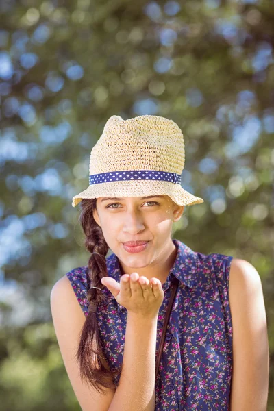 Pretty hipster blowing a kiss — Stock Photo, Image