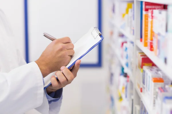 Scrittura del farmacista negli appunti — Foto Stock