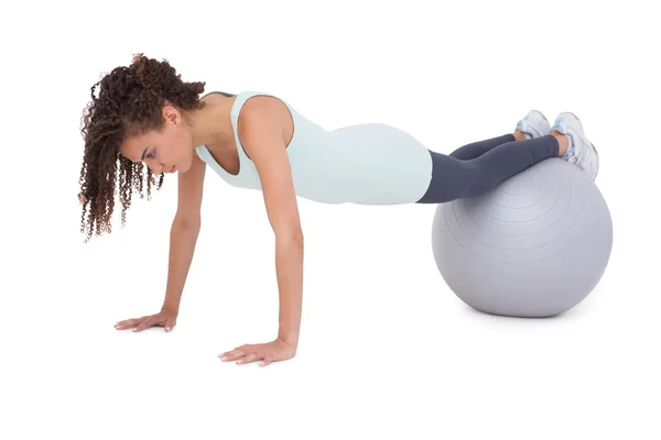 Fit woman wokring out on exercise ball — Stock Photo, Image