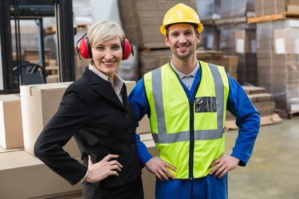 Warehouse worker and manager — Stock Photo, Image