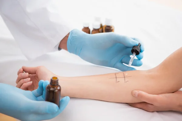 Doctor doing skin prick test at patient — Stock Photo, Image