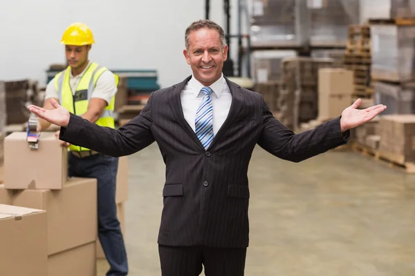 Smiling boss with hands out — Stock Photo, Image