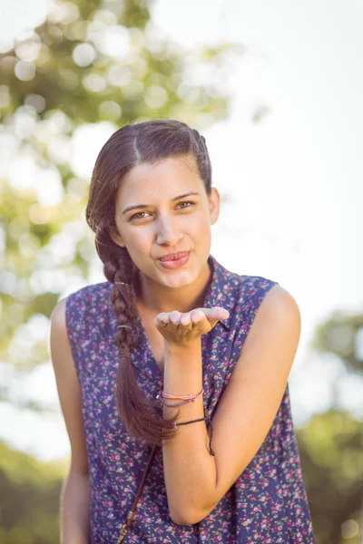 Pretty hipster blowing a kiss — Stock Photo, Image