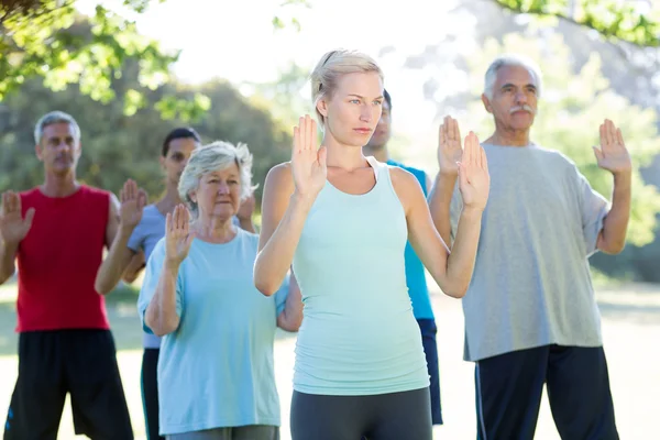 Athletic group showing their hands — Stock Photo, Image
