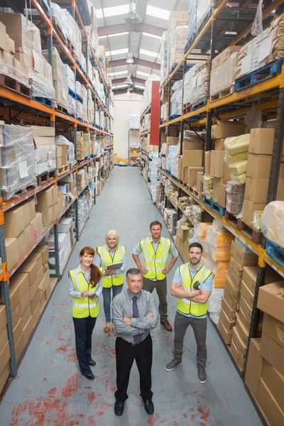 Team standing behind their boss — Stock Photo, Image