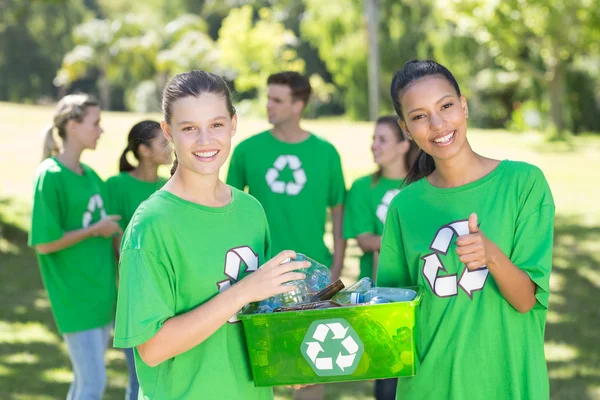 Happy environmental activists in the park — Stock Photo, Image