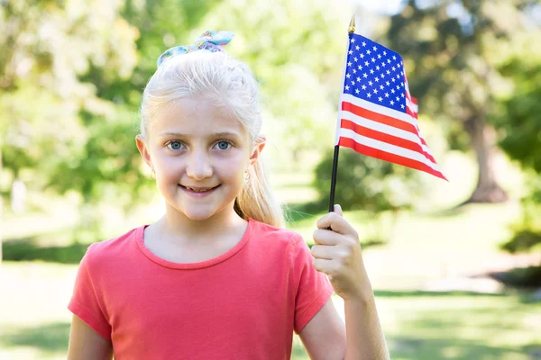 Menina acenando bandeira americana Imagem De Stock