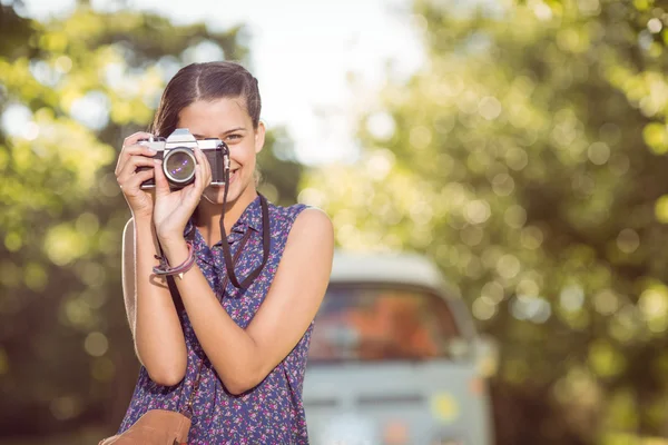 Pretty hipster taking a photo — Stock Photo, Image