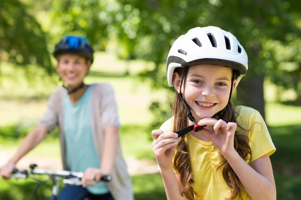 Mother and daughter on their bike — Stock Photo, Image