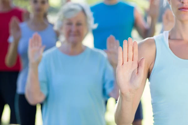 Athletic group showing their hands — Stock Photo, Image