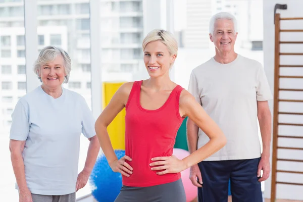 Female instructor with senior couple — Stock Photo, Image