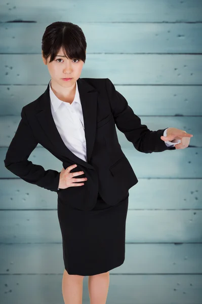 Focused businesswoman pointing — Stock Photo, Image