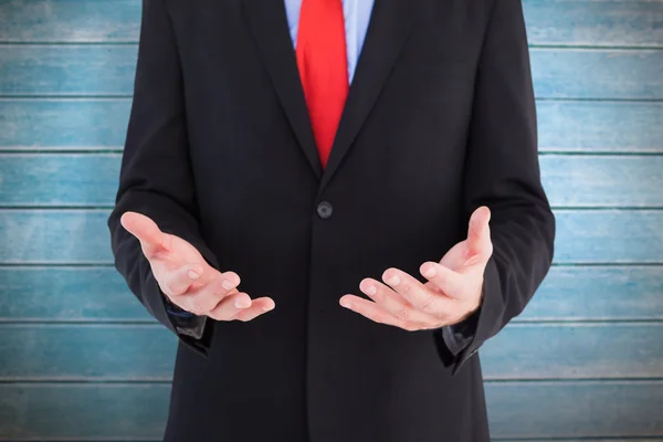 Businessman presenting with his hands — Stock Photo, Image