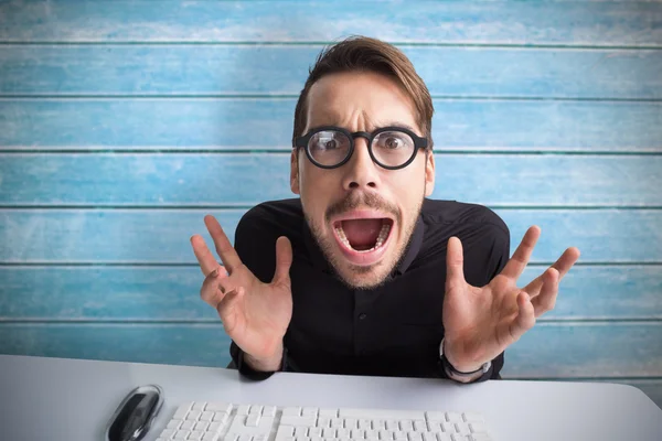 Businessman with glasses using computer — Stock Photo, Image