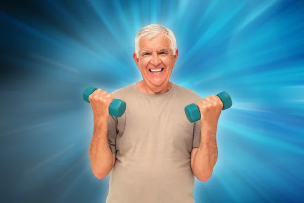 Retrato de un hombre mayor feliz haciendo ejercicio — Foto de Stock