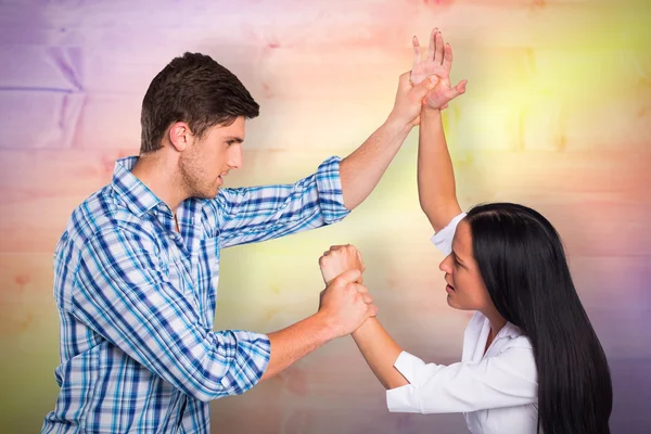 Man overpowering his girlfriend — Stock Photo, Image