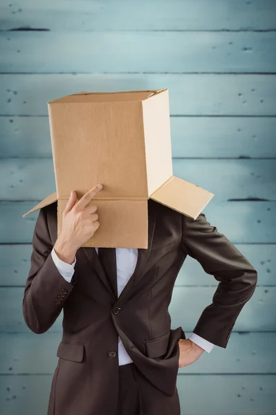 Anonymous businessman touching his chin — Stock Photo, Image