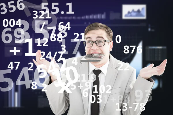 Geeky shrugging businessman biting calculator — Stock Photo, Image