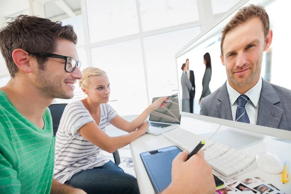 Proud manager posing in front of his team — Stock Photo, Image