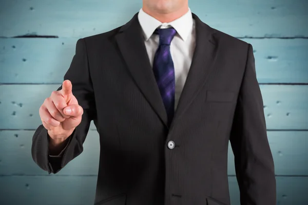 Businessman standing and pointing — Stock Photo, Image