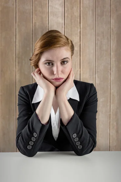 Redhead businesswoman looking unhappy — Stock Photo, Image