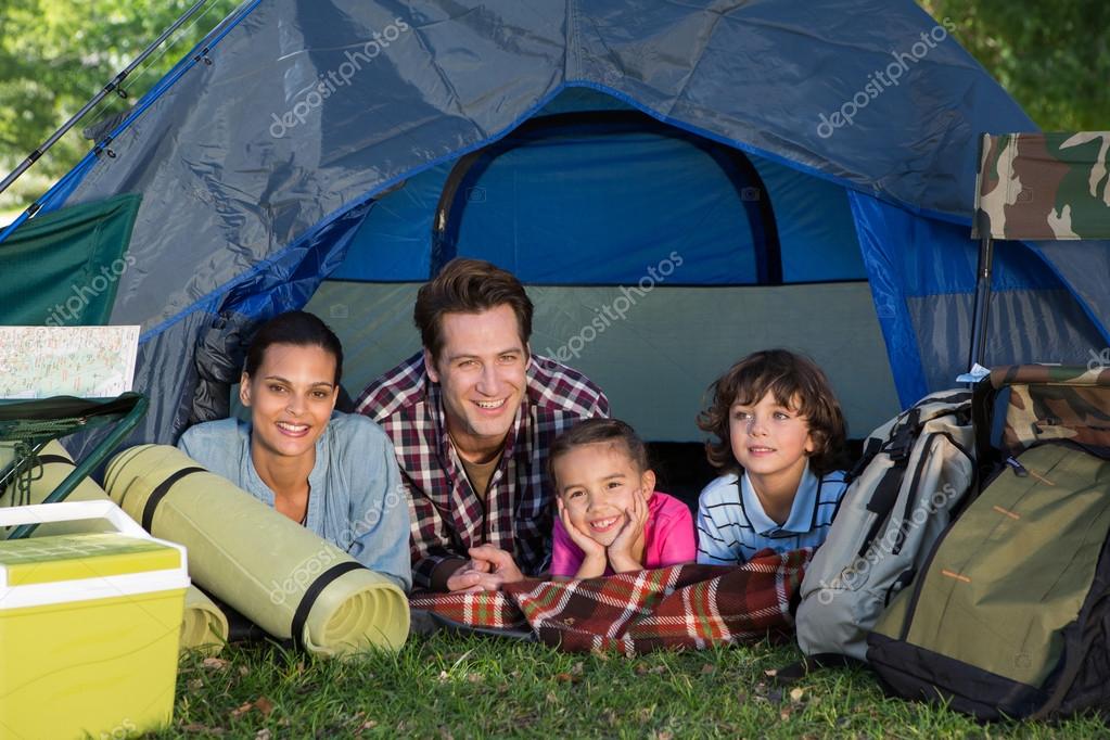 Family on camping trip in their tent — Stock Photo © Wavebreakmedia