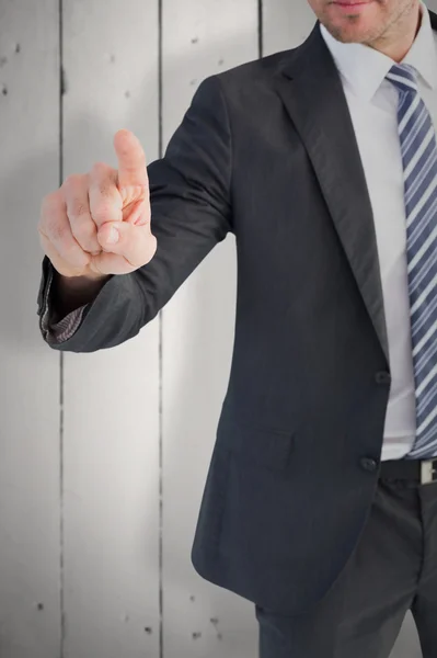 Businessman pointing with his finger — Stock Photo, Image