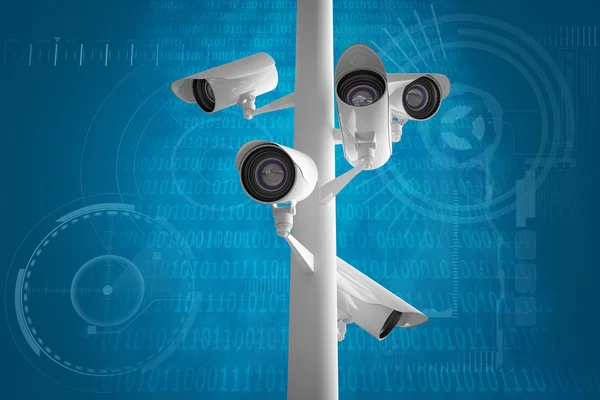 CCTV camera against shiny blue binary code — Stock Photo, Image