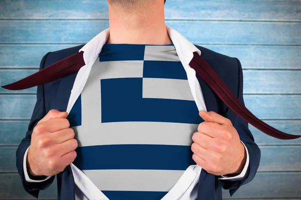 Businessman opening shirt to reveal greece flag — Stock Photo, Image