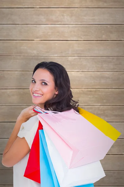 Jolie brune avec des sacs à provisions — Photo