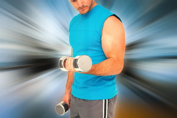 Fit man exercising with dumbells — Stock Photo, Image
