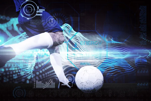 Kompozit kép labdarúgó játékos rúgja a labdát — Stock Fotó