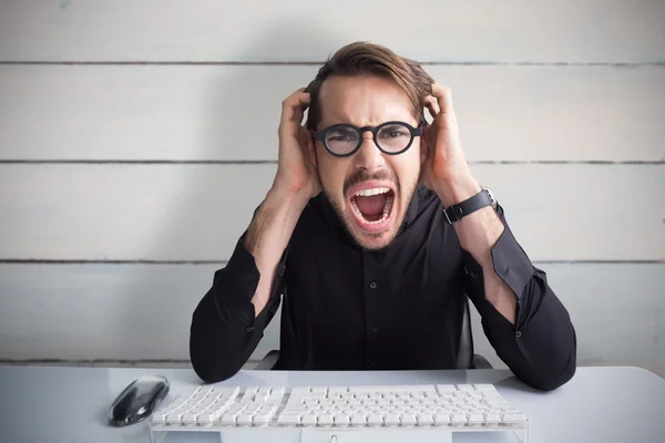 Businessman yelling with his hands on face — Stock Photo, Image