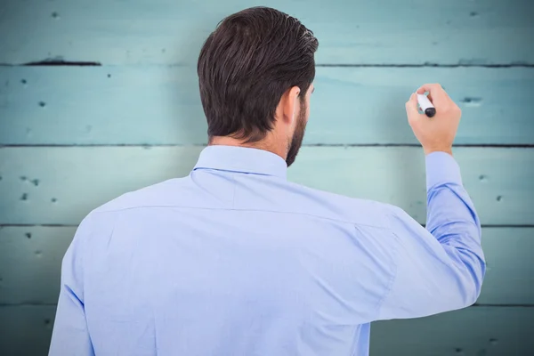 Geschäftsmann im Anzug schreibt mit Filzstift — Stockfoto