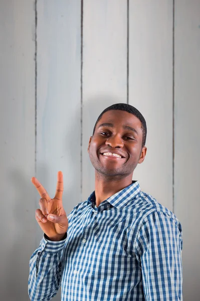 Happy businessman making peace sign — Stock Photo, Image